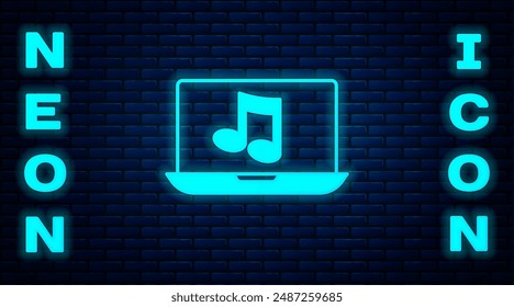 Glowing neon Laptop with music note symbol on screen icon isolated on brick wall background.  Vector