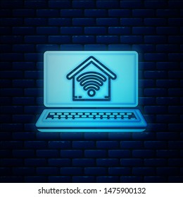 Glowing neon Laptop with smart home with wi-fi icon isolated on brick wall background. Remote control.  Vector Illustration