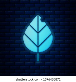 Glowing neon Leaf icon isolated on brick wall background. Fresh natural product symbol.  Vector Illustration