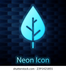 Glowing neon Leaf icon isolated on brick wall background. Fresh natural product symbol.  Vector