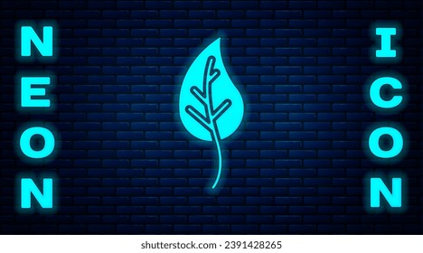 Glowing neon Leaf icon isolated on brick wall background. Leaves sign. Fresh natural product symbol.  Vector