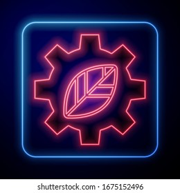 Glowing neon Leaf plant ecology in gear machine icon isolated on blue background. Eco friendly technology. World Environment day label.  Vector Illustration