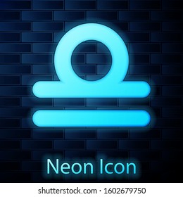 Glowing neon Libra zodiac sign icon isolated on brick wall background. Astrological horoscope collection.  Vector Illustration