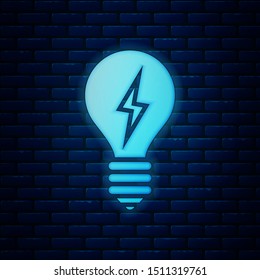 Glowing neon Light bulb with lightning symbol icon isolated on brick wall background. Light lamp sign. Idea symbol.  Vector Illustration