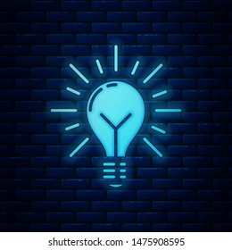 Glowing neon Light bulb with rays shine and concept of idea icon isolated on brick wall background. Energy and idea symbol. Inspiration concept.  Vector Illustration