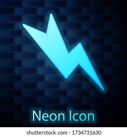 Glowing neon Lightning bolt icon isolated on brick wall background. Flash sign. Charge flash icon. Thunder bolt. Lighting strike. Vector Illustration