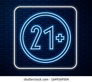 Glowing neon line 21 plus icon isolated on brick wall background. Adults content icon.  Vector Illustration