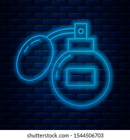 Glowing neon line Aftershave icon isolated on brick wall background. Cologne spray icon. Male perfume bottle.  Vector Illustration