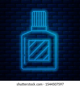 Glowing neon line Aftershave icon isolated on brick wall background. Cologne spray icon. Male perfume bottle.  Vector Illustration