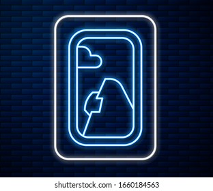 Glowing neon line Airplane window icon isolated on brick wall background. Aircraft porthole.  Vector Illustration