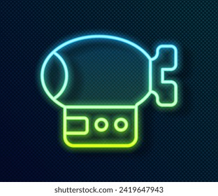 Glowing neon line Airship icon isolated on black background.  Vector