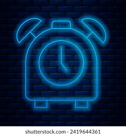 Glowing neon line Alarm clock icon isolated on brick wall background. Wake up, get up concept. Time sign.  Vector