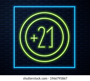 Glowing neon line Alcohol 21 plus icon isolated on brick wall background. Prohibiting alcohol beverages.  Vector Illustration