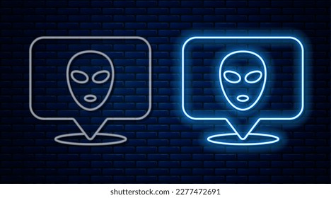 Glowing neon line Alien icon isolated on brick wall background. Extraterrestrial alien face or head symbol.  Vector