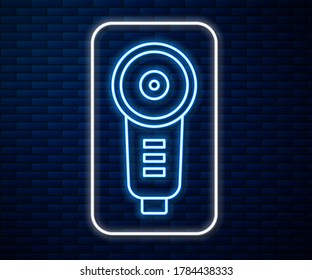 Glowing neon line Angle grinder icon isolated on brick wall background.  Vector Illustration