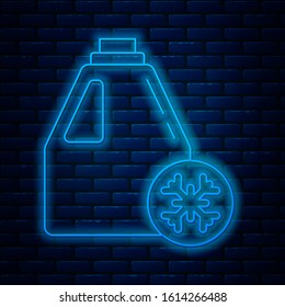 Glowing neon line Antifreeze canister icon isolated on brick wall background. Auto service. Car repair.  Vector Illustration