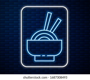 Glowing neon line Asian noodles in bowl and chopsticks icon isolated on brick wall background. Street fast food. Korean, Japanese, Chinese food.  Vector Illustration