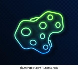 Glowing neon line Asteroid icon isolated on blue background.  Vector Illustration
