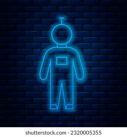 Glowing neon line Astronaut icon isolated on brick wall background.  Vector Illustration