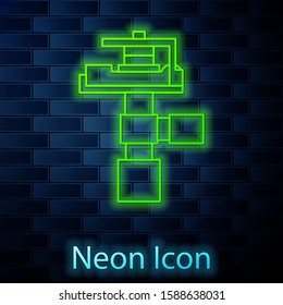 Glowing neon line Automatic irrigation sprinklers icon isolated on brick wall background. Watering equipment. Garden element. Spray gun icon.  Vector Illustration
