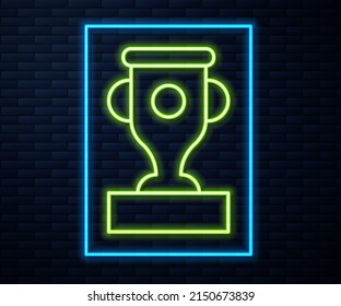 Glowing Neon Line Award Cup Icon Isolated On Brick Wall Background. Winner Trophy Symbol. Championship Or Competition Trophy. Sports Achievement Sign.  Vector