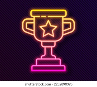 Glowing neon line Award cup icon isolated on black background. Winner trophy symbol. Championship or competition trophy. Sports achievement sign.  Vector