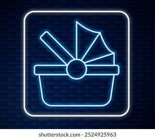 Glowing neon line Baby stroller icon isolated on brick wall background. Baby carriage, buggy, pram, stroller, wheel.  Vector