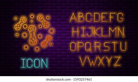 Glowing neon line Bacteria icon isolated on brick wall background. Bacteria and germs, microorganism disease causing, cell cancer, microbe, virus, fungi. Neon light alphabet. Vector Illustration