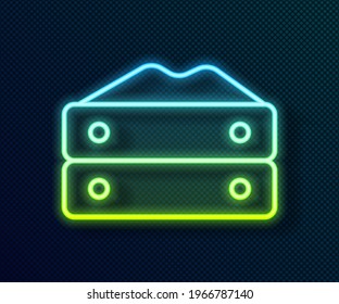 Glowing neon line Bag of flour icon isolated on black background.  Vector