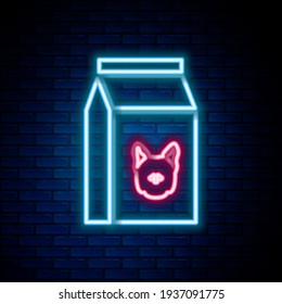 Glowing neon line Bag of food for dog icon isolated on brick wall background. Food for animals. Pet food package. Colorful outline concept. Vector