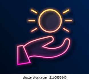 Glowing neon line Ball levitating above hand icon isolated on black background. Levitation symbol.  Vector