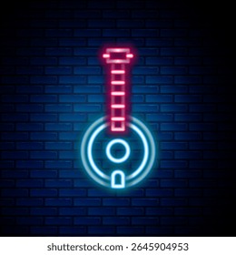 Glowing neon line Banjo icon isolated on brick wall background. Musical instrument. Colorful outline concept. Vector