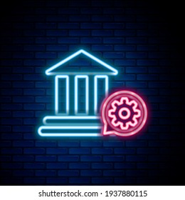 Glowing neon line Bank building and gear icon isolated on brick wall background. Adjusting app, service concept, setting options, maintenance, repair, fixing. Colorful outline concept. Vector