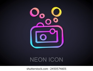 Glowing neon line Bar of soap icon isolated on black background. Soap bar with bubbles.  Vector