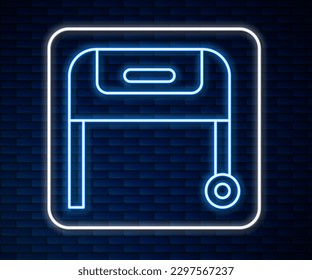 Glowing neon line Barbecue grill icon isolated on brick wall background. BBQ grill party.  Vector