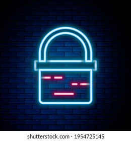 Glowing neon line Basket icon isolated on brick wall background. Online buying concept. Delivery service sign. Shopping cart symbol. Colorful outline concept. Vector