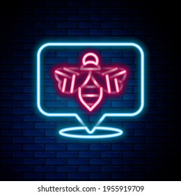 Glowing neon line Bee icon isolated on brick wall background. Sweet natural food. Honeybee or apis with wings symbol. Flying insect. Colorful outline concept. Vector