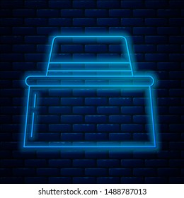 Glowing neon line Beekeeper with protect hat icon isolated on brick wall background. Special protective uniform.  Vector Illustration