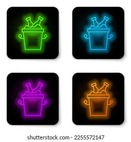 Glowing neon line Beer bottles in ice bucket icon isolated on white background. Black square button. Vector