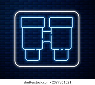 Glowing neon line Binoculars icon isolated on brick wall background. Find software sign. Spy equipment symbol.  Vector