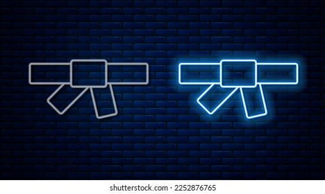 Glowing neon line Black karate belt icon isolated on brick wall background.  Vector