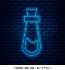 Glowing neon line Bottle with potion icon isolated on brick wall background. Flask with magic potion. Happy Halloween party.  Vector Illustration