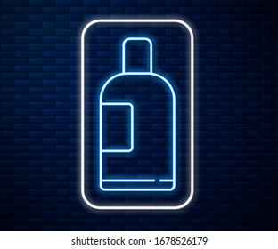 Glowing neon line Bottle of shampoo icon isolated on brick wall background.  Vector Illustration