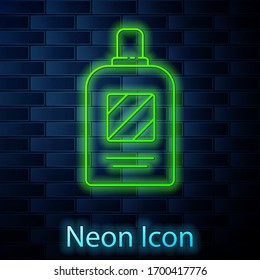 Glowing neon line Bottle of shampoo icon isolated on brick wall background. Vector Illustration