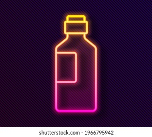 Glowing neon line Bottle of water icon isolated on black background. Soda aqua drink sign.  Vector Illustration