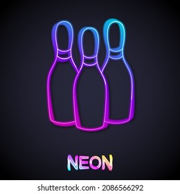 Glowing neon line Bowling pin icon isolated on black background. Juggling clubs, circus skittles.  Vector