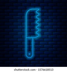 Glowing neon line Bread knife icon isolated on brick wall background. Cutlery symbol.  Vector Illustration