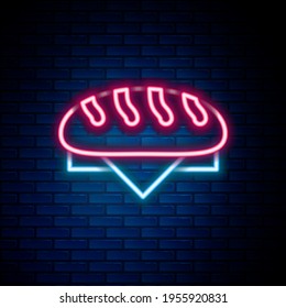 Icono de pan de neón brillante aislado en el fondo de pared de ladrillo. Concepto de esquema colorido. Vector