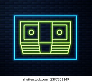 Glowing neon line Bribe money cash icon isolated on brick wall background. Money banknotes stacks. Bill currency.  Vector