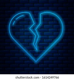 Glowing neon line Broken heart or divorce icon isolated on brick wall background. Love symbol. Valentines day.  Vector Illustration